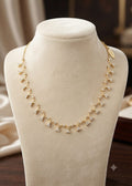 Diamond CZ Arc Cluster Gold Necklace on display bust